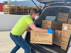 Loading a car with boxes